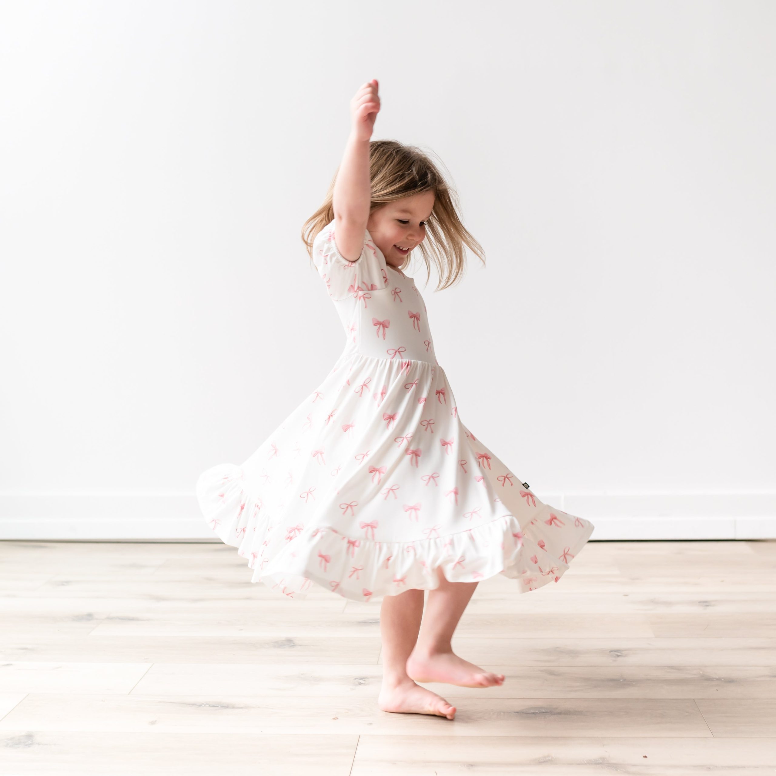 Puff Sleeve Twirl Dress in Bow - Image 3
