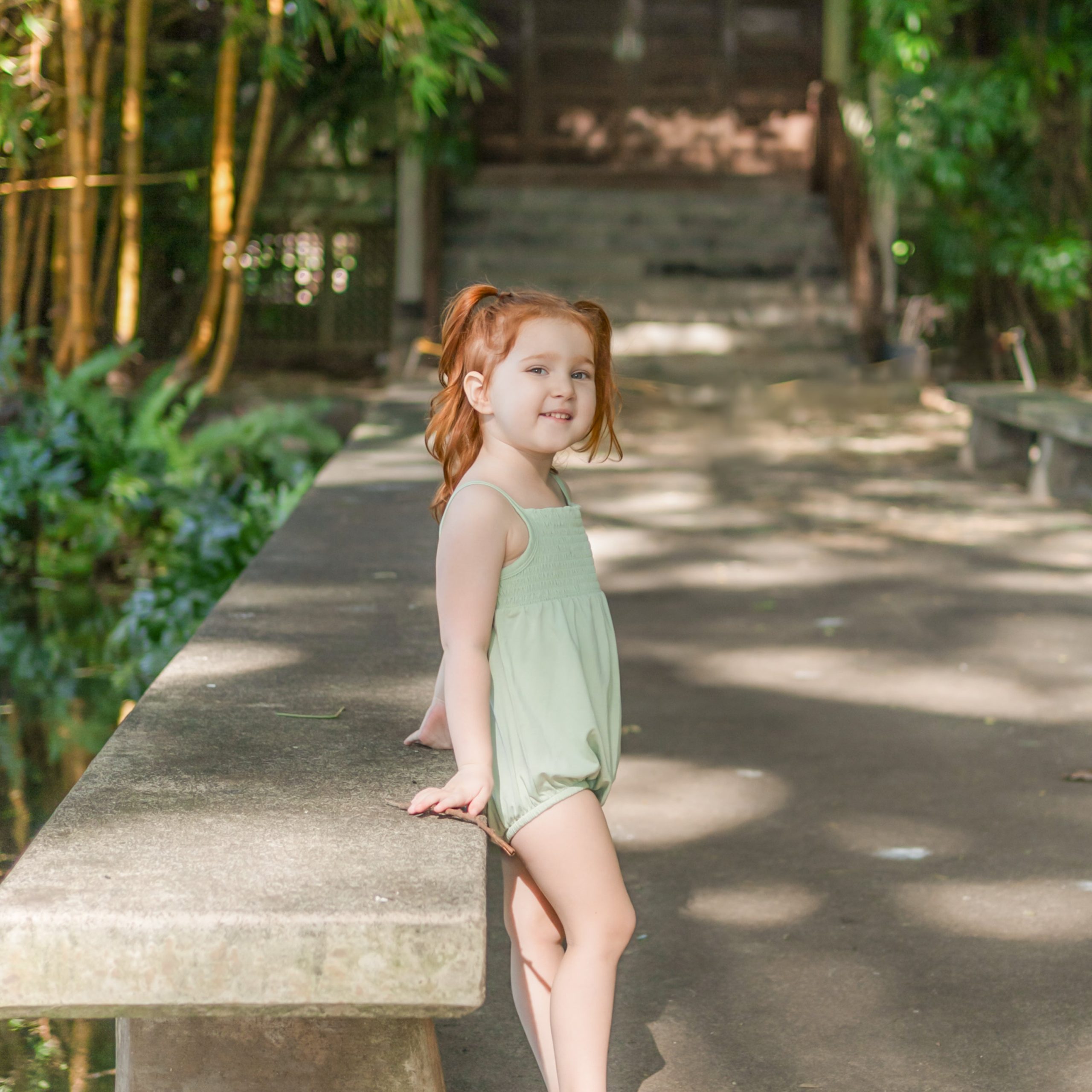 Smocked Bubble Romper in Basil - Image 3